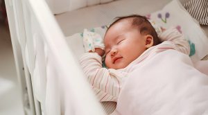 how to get baby to sleep in bassinet photo